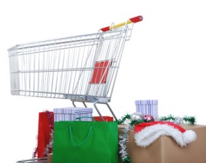 Shopping cart with boxes and bags, happy holidays