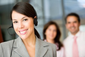 Woman wearing a headset working at customer support