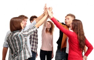 Pile of hands - Successful business team celebrating their success with a high five